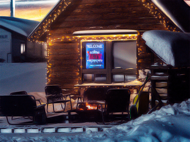 爺が岳スキー場中腹の雪に囲まれた夜のログハウス